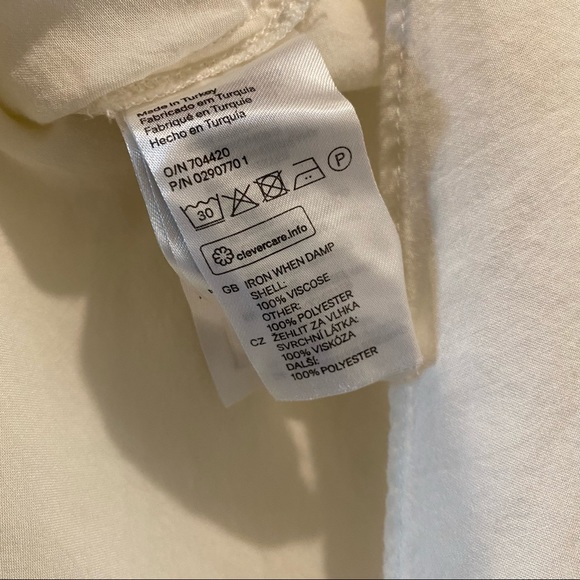 H&M cream short sleeve blouse with ruffle sleeves size 2 - Picture 5 of 5